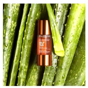 CLARINS PARIS Golden Glow Booster